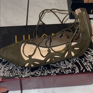 Green lace up flats